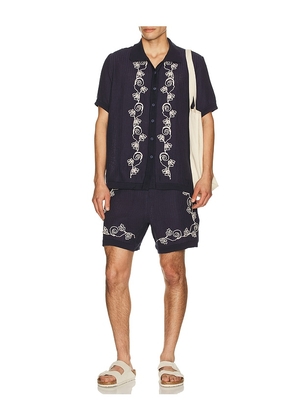 Agua Bendita Maury Shorts in Navy. Size 34. Also in 36.