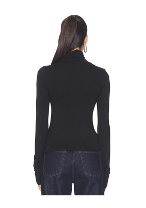 Eterne Fitted Turtleneck Top in Black. Size L. Also in S, M, XL.