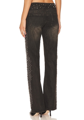 Jaded London Studded Low Rise Jeans in Denim-Dark. Size 25. Also in 24, 26, 28, 30, 32, 34.