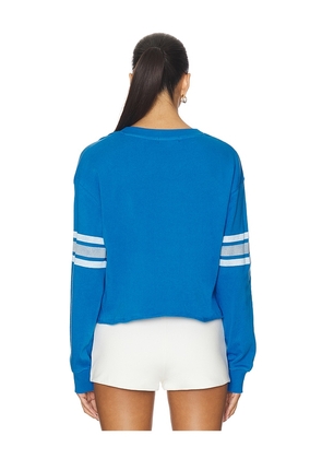 Junk Food Lions Retro Crop Sweatshirt in Blue. Size S. Also in XS, L, XL/1X.