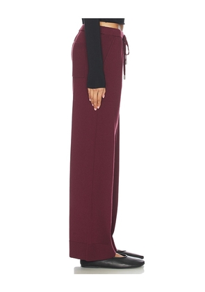SIMKHAI Travel Pant in Red. Size S. Also in L.