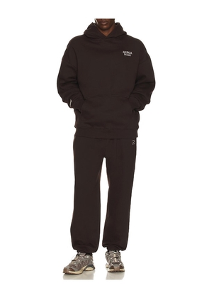 Huega House Icon Hoodie in Brown. Size M. Also in S.