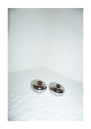 HueGah Home Noa Candlestick Holder in Metallic Silver.