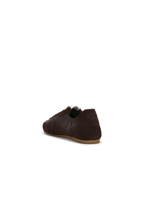 SIMKHAI Eden Elasticized Leather Combo Sneaker in Brown. Size 38. Also in 37, 39.