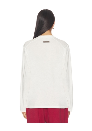 Fear of God ESSENTIALS Classic Fit Long Sleeve Tee in Ivory. Size M. Also in XS, S.