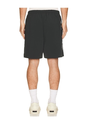 Fear of God ESSENTIALS Classic Short in Black. Size M. Also in S, L.