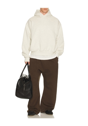 Fear of God ESSENTIALS Classic Hoodie in Light Grey. Size M. Also in L, XXL/2X.