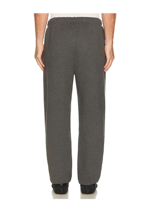 Fear of God ESSENTIALS Classic Sweatpant in Black. Size M. Also in L, XXL/2X.