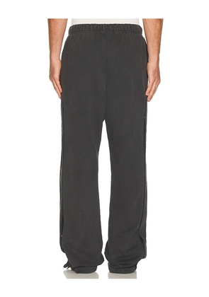 Fear of God ESSENTIALS Tearaway Pant in Grey. Size M. Also in L, XL/1X, XXL/2X.