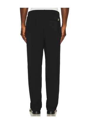 Fred Perry Cross Tape Track Pant in Black. Size M. Also in S, L, XL/1X.