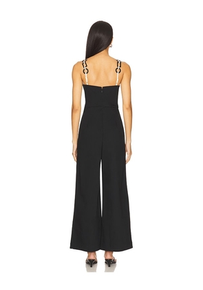 Saudade Charm Jumpsuit in Black. Size S. Also in XS, M.