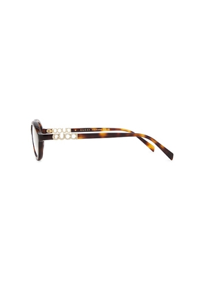 Gucci Oval Eyeglasses in Brown.