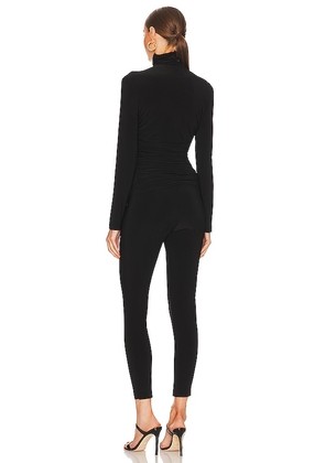 Norma Kamali Turtleneck Catsuit in Black. Size M. Also in L, XL.