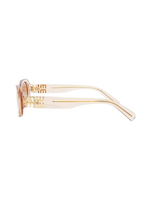 Miu Miu Oval Sunglasses in Pink.