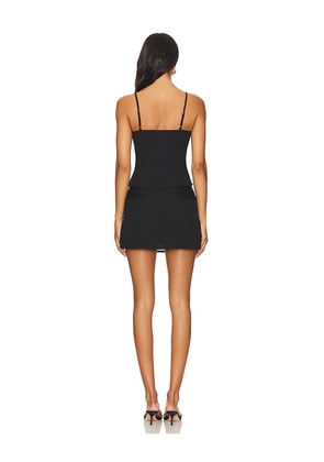 MORE TO COME Daria Skirt Set in Black. Size M. Also in XXS, XL.