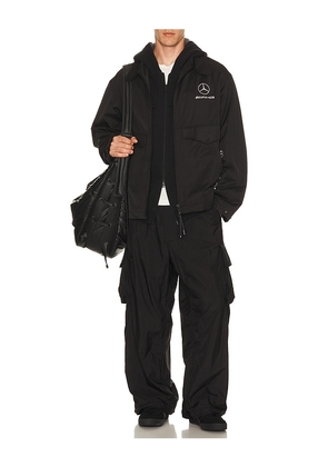 Y-3 x F1 Wolf Jacket in Black. Size L. Also in M.