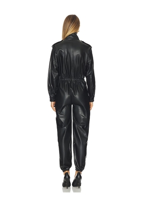 Norma Kamali Turtleneck Cargo Jumpsuit in Black. Size XS. Also in S.