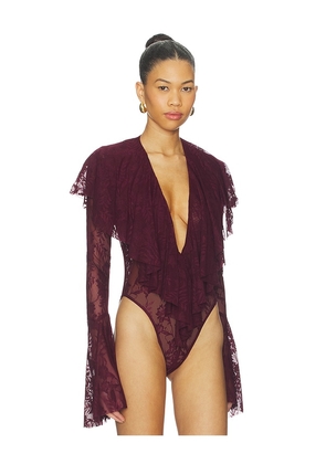 Norma Kamali Long Sleeve Deep V Ruffle Bodysuit in Burgundy. Size M. Also in XS, S, XXS.