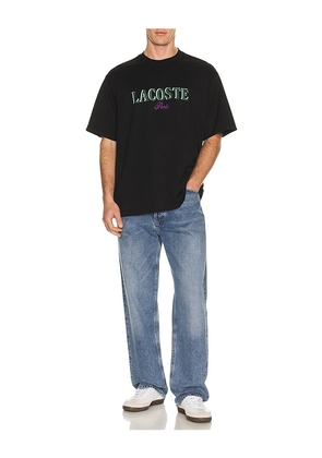 Lacoste Loose Fit Logo Tee in Black. Size 4. Also in 5.