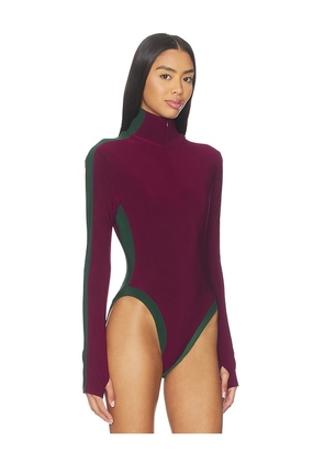 Norma Kamali Side Stripe Turtleneck Bodysuit in Burgundy,Dark Green. Size M. Also in S.