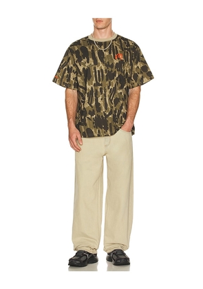 Malbon Tour Divot Bermuda Tee in Green. Size M. Also in S, L, XL/1X.