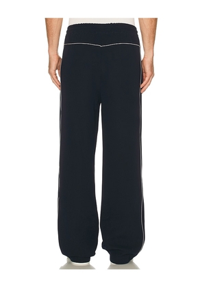 KROST Piping Track Pant in Navy. Size S. Also in M.