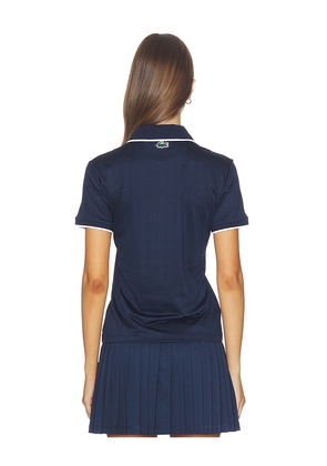 Lacoste Tennis Performance Top in Navy. Size 32. Also in 34, 36.