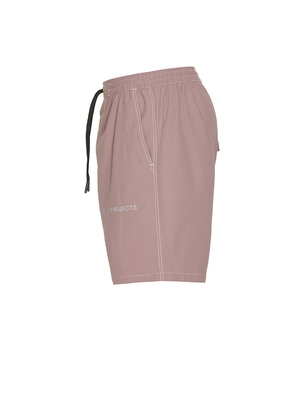 Rivvia Projects Contrast Daily Ride Swim Short in Mauve. Size 32. Also in 30, 34.