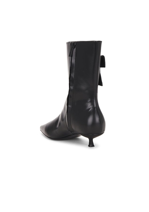 St. Agni Petit Pouch Boot in Black. Size 37. Also in 36, 38.