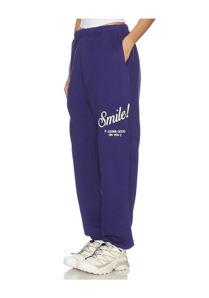 The Mayfair Group Smile Sweatpants in Purple. Size M/L. Also in XS, S/M, L/XL.