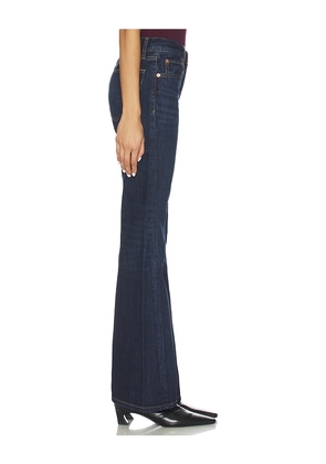 RE/DONE Twisted Mid Rise Bootcut Jeans in Blue. Size 25. Also in 26, 27, 28, 29, 30, 31, 32.
