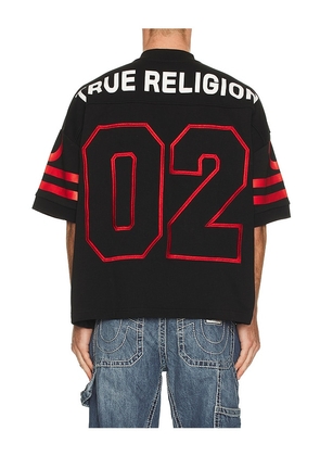 True Religion Football Knit Boxy Jersey in Black. Size M. Also in L, XL/1X.