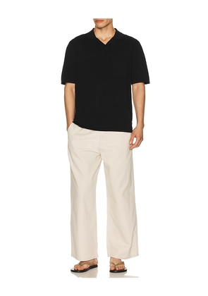 Rhythm Textured Knit Johnny Polo in Black. Size L. Also in M.