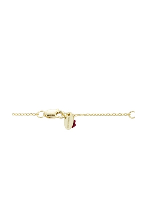 SHASHI Oval Solitaire East To West Necklace in Metallic Gold.