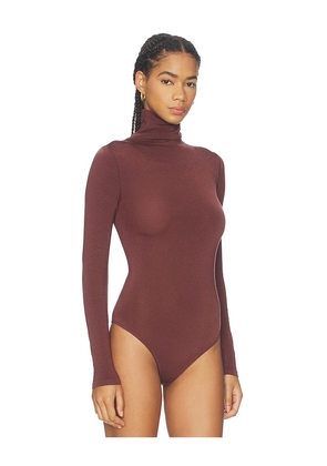 Wolford Colorado String Bodysuit in Rust. Size S. Also in XS, M.