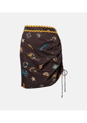 Alemais Printed ruched cotton miniskirt