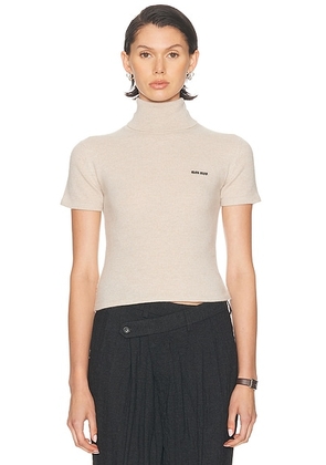Miu Miu Turtleneck Short Sleeve Top in Sabbia - Tan. Size 36 (also in ).