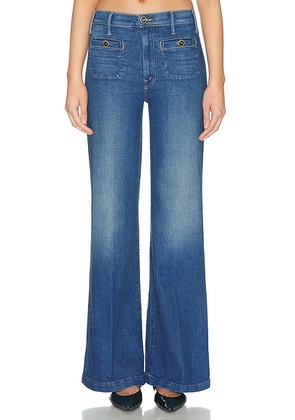 MOTHER The Stashed Hustler Roller Sneak Jeans in Whisk Me Away - Blue. Size 23 (also in 24, 25, 26, 27, 28, 29, 30, 31, 32, 33, 34).