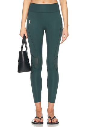 On Train Volt Tights in Obsidian - Dark Green. Size L (also in M, S, XS).