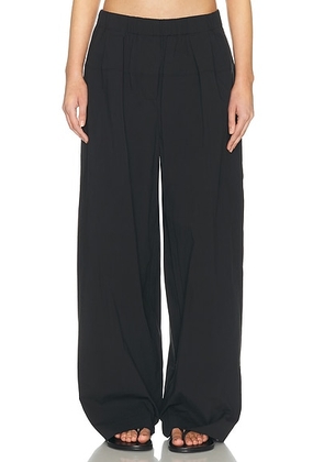 St. Agni Relaxed Pleat Pant in Black - Black. Size L (also in M).