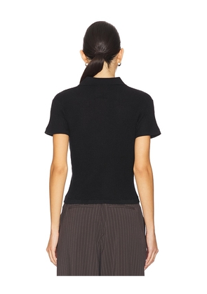 Guest In Residence Shrunken Polo Top in Black. Size M. Also in XS, L.