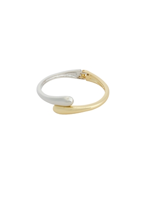 petit moments Thin Livorno Cuff Bracelet in Metallic Gold.