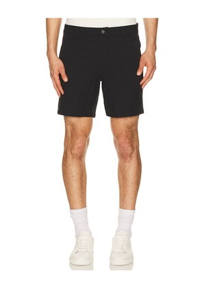 Rhone 7 Nomad Tech Chino Short in Black. Size 30. Also in 31, 32, 33, 34, 36.