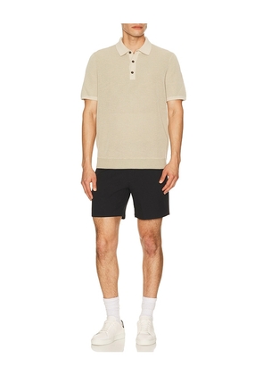 Rhone 7 Nomad Tech Chino Short in Black. Size 30. Also in 31, 32, 34.