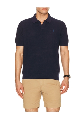 Polo Ralph Lauren Short Sleeve Textured Johnny Collar Polo Sweater in Navy. Size L. Also in M, S, XL/1X, XXL/2X.