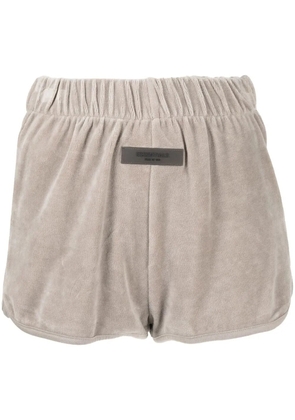 FEAR OF GOD ESSENTIALS logo-patch velour shorts - Grey