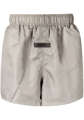 FEAR OF GOD ESSENTIALS front-logo techical track pants - Green