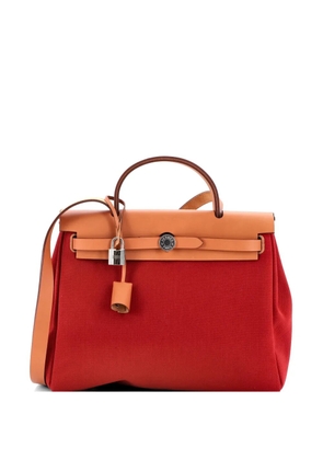 Hermès Pre-Owned Herbag Zip Leather and Toile 31 shoulder bag - Red