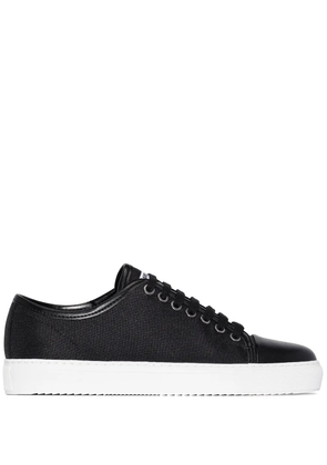 Axel Arigato panelled low-top sneakers - Black