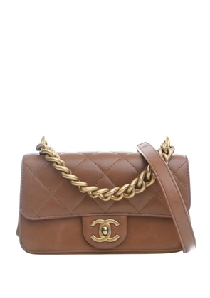 CHANEL Pre-Owned 2018-2019 Paris Cosmopolite Mini Quilted Calfskin Straight Lined Flap satchel - Brown